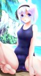  ass bangs barefoot beach black_hairband blue_eyes blue_swimsuit blunt_bangs blurry bob_cut covered_navel day depth_of_field evandragon eyebrows_visible_through_hair hairband highres konpaku_youmu looking_at_viewer one-piece_swimsuit school_swimsuit shore short_hair silver_hair solo spread_legs swimsuit touhou 