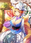  animal_ears blonde_hair blush breasts cleavage commentary_request fox_ears fox_tail hair_between_eyes hat highres large_breasts liya long_sleeves looking_at_viewer multiple_tails partial_commentary pillow_hat short_hair solo tail touhou wide_sleeves yakumo_ran yellow_eyes 