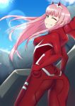  aqua_eyes ass bodysuit breasts commentary darling_in_the_franxx day hairband hand_on_hip highres looking_at_viewer medium_breasts nealayiskah one_eye_closed pink_hair red_bodysuit red_horns sky smile solo standing sun white_hairband zero_two_(darling_in_the_franxx) 