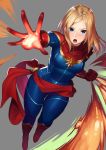  blonde_hair blue_eyes bodysuit boots breasts captain_marvel carol_danvers clenched_hand gloves highres kagematsuri long_hair marvel medium_breasts open_mouth red_footwear red_gloves sash simple_background solo superhero 