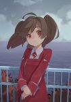  ahoge brown_hair closed_mouth eyebrows_visible_through_hair highres kantai_collection long_sleeves looking_at_viewer ocean outdoors pikumin railing red_eyes ryuujou_(kantai_collection) short_twintails solo twintails 