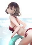  ass bangs bikini breasts brown_hair commentary day from_side grey_eyes innertube leaning_forward lips medium_breasts ocean original red_bikini short_hair side-tie_bikini soft_focus solo strap_gap swimsuit vafar7 