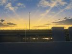  bridge cloud cloudy_sky commentary english_commentary gradient_sky guard_rail highres lamppost making_of mclelun no_humans outdoors scenery sky sunset twilight yellow_sky 