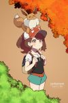  :3 artist_name ayumi_(pokemon) backpack bag black_shirt blush brown_eyes brown_hair commentary copyright_name eevee english english_commentary flat_chest floatingapple green_shorts hands_up hat highres looking_up no_mouth outdoors poke_ball_theme pokemon pokemon_(game) pokemon_lgpe pokemon_on_head ponytail red_hat shirt short_shorts short_sleeves shorts smile standing tied_hair tree twitter_username 