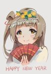  bangs blush brown_eyes brown_hair closed_mouth commentary commentary_typo english english_commentary fan flower folding_fan grey_background hair_flower hair_ornament hand_up haoni happy_new_year holding holding_fan long_hair looking_at_viewer love_live! love_live!_school_idol_project minami_kotori new_year one_side_up simple_background smile solo upper_body yellow_flower 