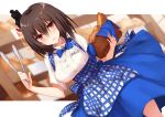  1girl alternate_costume apron baguette basket black_hair blue_apron blue_neckwear blue_skirt blurry blurry_background blush bread breasts dutch_angle eyebrows_visible_through_hair food hair_between_eyes hair_ornament hand_up highres holding kantai_collection kerchief kinona kobeya koubeya_uniform looking_at_viewer medium_breasts medium_hair neck_ribbon open_mouth parted_lips plaid plaid_apron pocket red_eyes ribbon shirt short_sleeves skirt smile solo standing tongs waitress white_shirt yamashiro_(kancolle) yamashiro_(kantai_collection) 