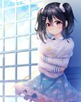  against_wall bangs black_hair blue_skirt cloud_print frilled_skirt frills hair_between_eyes hair_ornament hairpin indoors kyouou_ena light_blush long_sleeves looking_at_viewer love_live! love_live!_school_idol_project pillow pillow_hug print_pillow print_skirt rainbow red_eyes skirt smile solo star star_print twintails window wing_hair_ornament yazawa_nico 