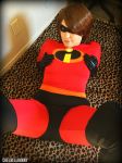  1girl ass bodysuit boots breasts brown_eyes brown_hair cosplay costume domino_mask elastigirl female helen_parr legs mask photo short_hair skin_tight solo the_incredibles 