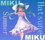  bare_arms blue_background character_name dress floating_hair green_eyes green_hair hair_between_eyes hat hatsune_miku highres long_hair looking_at_viewer smile solo strapless strapless_dress sun_hat twintails vocaloid zhongwu_chahui 