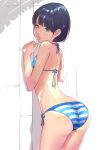  against_wall ass bikini black_eyes black_hair blue_bikini cowboy_shot from_behind iwanishi lips looking_at_viewer original side-tie_bikini solo standing striped striped_bikini swimsuit 