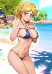  1girl artist_name bare_arms bare_shoulders beach bikini blonde_hair blue_bikini blue_eyes blush breasts cleavage collarbone commentary_request day gundam hands_on_own_chest hands_up highres kikka_kitamoto looking_at_viewer medium_breasts medium_hair navel oyaman parted_bangs parted_lips photo_background shadow shiny_skin stomach swimsuit thighs water 