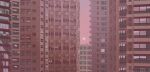  building city commentary english_commentary gradient_sky landscape nadaskii no_humans original outdoors pink_sky simple_bird sky skyscraper sun sunset window 