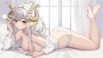 1girl absurdres ahoge ass bare_legs bare_shoulders barefoot breasts character_request commentary_request copyright_request crop_top hand_up highres holding horns large_breasts lying off_shoulder on_stomach ruochi_lk solo thighs virtual_youtuber white_hair yellow_eyes 