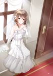  bangs bare_shoulders bow bridal_veil brown_eyes brown_hair collarbone commentary_request day dress elbow_gloves eyebrows_visible_through_hair gloves hair_between_eyes hair_bow hand_up heart heart_necklace highres indoors jewelry kantai_collection mashiro_aa open_door ring see-through sitting solo strapless strapless_dress sunlight taihou_(kantai_collection) veil wedding_band wedding_dress white_bow white_dress white_gloves window 