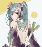  aqua_eyes aqua_hair bare_shoulders closed_mouth commentary detached_sleeves eyebrows_visible_through_hair from_behind green_eyes green_hair hatsune_miku headphones headset highres long_hair looking_at_viewer looking_back skirt sleeveless solo spring_onion symbol_commentary tattoo twintails very_long_hair vocaloid ziuuun 