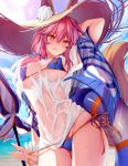  animal_ear_fluff animal_ears arm_up bangs beach beach_umbrella bikini bikini_pull blue_bikini blue_sky blush breasts collarbone commentary_request covered_navel day ears_through_headwear fate/extra fate/grand_order fate_(series) fox_ears fox_tail hat hips innertube large_breasts looking_at_viewer obiwan ocean pink_hair sash shirt sidelocks sky smile solo straw_hat sun_hat sunlight swimsuit tail tamamo_(fate)_(all) tamamo_no_mae_(swimsuit_lancer)_(fate) thighs umbrella wet wet_clothes wet_shirt wet_t-shirt yellow_eyes 