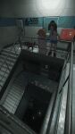  2girls black_hair brown_hair hayasabro indoors multiple_girls nichijou professor_shinonome shinonome_nano short_hair spiral_staircase stairs standing window 