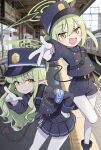  2girls :d armband badge belt blue_archive blue_armband blue_coat blue_hat blue_shorts blue_skirt coat commentary_request demon_tail earrings fang feet_out_of_frame gloves green_hair hair_between_eyes hand_on_own_hip hat highres hikari_(blue_archive) jewelry leaning_forward looking_at_viewer medium_hair multiple_girls nozomi_(blue_archive) pantyhose photo_background pleated_skirt pointing pointing_up pointy_ears ponconyan shorts siblings side-by-side sidelocks single_earring skin_fang skirt smile standing standing_on_one_leg tail train_station train_station_platform twins twintails v white_gloves white_pantyhose yellow_eyes 
