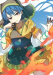 1girl absurdres apron ayayayaya63 between_fingers blue_hair closed_mouth commentary_request dress fire green_apron green_headscarf haniyasushin_keiki headscarf highres holding jewelry long_hair looking_at_viewer magatama magatama_necklace necklace object_in_pocket pocket puffy_short_sleeves puffy_sleeves short_hair short_sleeves single_strap smile solo touhou wood_carving_tool yellow_dress 