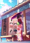  black_hair cherry_blossoms eyebrows_visible_through_hair floral_print from_behind full_body geta hair_bun japanese_clothes kimono kuro-kun_(nablack) looking_at_viewer oriental_umbrella original red_eyes red_kimono sidelocks solo storefront umbrella 