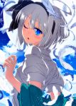  ahoge blouse blue_eyes colored_eyelashes commentary feathers hairband highres konpaku_youmu konpaku_youmu_(ghost) looking_at_viewer looking_back one_eye_closed parted_lips sazanami_mio short_sleeves silver_hair solo touhou upper_body white_blouse 