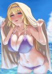  bare_shoulders bikini blonde_hair blue_eyes blue_sky blush breasts cloud collarbone commentary_request day front-tie_bikini front-tie_top granblue_fantasy hairband huge_breasts jeanne_d'arc_(granblue_fantasy) leaning_forward lips long_hair navel ocean open_mouth side-tie_bikini sky solo stomach swimsuit thighs tomiokasena tower wading 