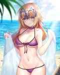  beach bikini blue_eyes blue_sky breasts choker closed_mouth cloud day embarrassed eyebrows_visible_through_hair fate/grand_order fate_(series) headpiece highres jeanne_d'arc_(fate) jeanne_d'arc_(fate)_(all) large_breasts looking_at_viewer luobo_(nsnr8754) navel ocean purple_bikini purple_choker sky solo standing swimsuit towel wavy_mouth wet 