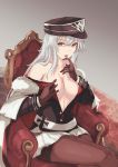  absurdres azur_lane breasts cleavage finger_licking gloves graf_zeppelin_(azur_lane) hand_in_hair hand_on_breast hat highres licking long_hair looking_at_viewer military military_hat military_uniform open_clothes pantyhose red_eyes silver_hair simple_background sitting solo tsyn uniform 