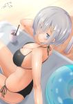  absurdres bikini black_bikini blue_eyes breasts cleavage cowboy_shot dated drink drinking_straw eyes_visible_through_hair hair_ornament hair_over_one_eye hairclip hamakaze_(kantai_collection) highres innertube kantai_collection large_breasts sand short_hair side-tie_bikini silver_hair solo swimsuit tokito_yu tumbler 