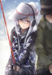  1boy 1girl admiral_(kantai_collection) bangs black_hair black_legwear blue_eyes blush breath camouflage_jacket cloud earmuffs eyebrows_visible_through_hair fishing fishing_rod flat_cap hair_between_eyes hammer_and_sickle hat hibiki_(kantai_collection) highres holding holding_fishing_rod jacket kantai_collection kuuru_(kuuru-n) long_hair long_sleeves open_mouth outdoors pleated_skirt school_uniform serafuku short_hair sitting skirt sky snow verniy_(kantai_collection) white_hair 