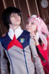 1boy 1girl bangs black_hair blue_eyes cosplay couple darling_in_the_franxx green_eyes hair_ornament hairband hands_on_another&#039;s_shoulders hetero hiro_(darling_in_the_franxx) horns long_hair long_sleeves looking_at_another military military_uniform necktie oni_horns orange_neckwear photo pink_hair red_horns red_neckwear short_hair uniform white_hairband zero_two_(darling_in_the_franxx) 