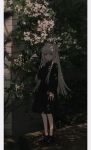  black_dress black_footwear blush dress eyebrows_visible_through_hair flower hirota_tsuu long_hair long_sleeves looking_at_viewer original outdoors parted_lips solo standing white_flower yellow_eyes 