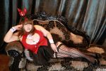  1girl animal_ears asian breasts brown_hair bunny_ears fat huge_breasts luu_(cosplayer) photo solo 
