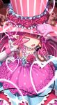  ;d absurdres arm_up bangs blue_eyes blush commentary_request dress elizabeth_bathory_(fate) elizabeth_bathory_(fate)_(all) eyebrows_visible_through_hair fangs fate/grand_order fate_(series) flower hair_between_eyes hand_up hat heart highres holding holding_microphone looking_at_viewer microphone one_eye_closed open_mouth pink_dress pink_flower pink_hair pink_hat pink_rose pointy_ears polka_dot polka_dot_dress red_flower red_rose rose sanbe_futoshi skull smile solo striped top_hat v_over_eye vertical-striped_hat vertical_stripes 