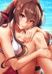  artist_name beach bikini blush breasts brown_hair cleavage closed_mouth collarbone day flower hair_between_eyes hair_flower hair_intakes hair_ornament hand_on_own_knee highres kantai_collection knees_up large_breasts lips long_hair looking_at_viewer nail_polish purple_eyes red_nails sakiyamama sarong sidelocks smile solo swimsuit thigh_strap very_long_hair white_bikini yamato_(kantai_collection) 