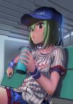  andou_shuuki baseball_cap baseball_uniform bench bottle collarbone commentary_request green_hair hair_between_eyes hat highres idolmaster idolmaster_million_live! looking_at_viewer nagayoshi_subaru red_eyes short_hair short_sleeves shorts sitting solo sportswear sweat water_bottle wristband 