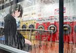  bangs black_hair black_hoodie brown_eyes commentary eyebrows_visible_through_hair from_outside hood hood_down hoodie indoors laundromat laundry long_sleeves looking_at_viewer looking_out_window looking_to_the_side original sakeharasu short_hair sitting solo washing_machine window window_writing 