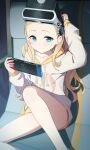  1girl arm_up blonde_hair blue_eyes chair closed_mouth collarbone commentary_request drawstring forehead head-mounted_display highres holding hood hood_down hoodie indoors knee_up kurumi_(lycoris_recoil) long_hair long_sleeves looking_at_viewer lycoris_recoil nintendo_switch office_chair ohihil on_chair puffy_long_sleeves puffy_sleeves sitting sleeves_past_wrists smile solo very_long_hair white_hoodie 