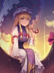 absurdres blonde_hair bow breasts brown_eyes eyebrows_visible_through_hair goback hat highres holding holding_umbrella large_breasts long_hair long_sleeves looking_at_viewer mob_cap parted_lips red_bow sitting smile solo teeth touhou umbrella yakumo_yukari 