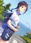  ahoge artist_name bag black_shorts blue_sky blush braid breasts brown_eyes brown_hair collared_shirt commentary_request cowboy_shot crosswalk day duffel_bag dutch_angle from_side gym_uniform highres lamppost light_smile long_hair looking_at_viewer looking_to_the_side nose_blush ocean original outdoors pairan parted_lips road shiny shiny_hair shirt short_sleeves shorts sidelocks single_braid sky small_breasts solo street town tree 