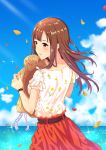  blue_sky brown_eyes brown_hair cloud day floating_hair floral_print from_behind hat hat_removed headwear_removed highres holding holding_hat idolmaster idolmaster_cinderella_girls lens_flare long_hair mizumoto_yukari ocean outdoors print_shirt red_skirt shiny shiny_hair shirt short_sleeves skirt sky solo sparkle straw_hat sunlight toufuu white_shirt 