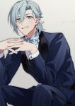  1boy aiue_o_eiua blue_bow blue_bowtie blue_eyes blue_jacket blue_pants bow bowtie brown_background grey_hair highres idolish7 jacket long_sleeves looking_at_viewer low_ponytail male_focus medium_hair own_hands_together pants shirt simple_background sitting smile solo teeth white_shirt yotsuba_tamaki 
