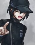  1boy baseball_cap black_background black_hair black_headwear black_jacket blush cellphone chiimako danganronpa_(series) danganronpa_v3:_killing_harmony hair_between_eyes hand_on_headwear hat holding holding_phone jacket long_sleeves looking_at_viewer male_focus phone saihara_shuichi short_hair simple_background solo upper_body yellow_eyes 