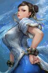  1girl ass blue_pants breasts brown_eyes brown_hair china_dress chinese_clothes chun-li double_bun dress earrings eyeshadow hair_bun hand_on_own_hip highres jewelry large_breasts makeup miche pants red_eyeshadow short_hair short_sleeves solo street_fighter street_fighter_6 upper_body white_dress 