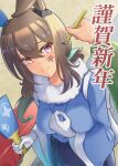  1girl 1other admire_vega_(umamusume) animal_ears blue_kimono blush breasts brown_hair calligraphy calligraphy_brush closed_mouth commentary_request drawing_on_another's_face ear_covers green_kimono hagoita hair_between_eyes harukana1013 highres holding holding_brush holding_calligraphy_brush holding_paddle holding_paintbrush horse_ears horse_girl ink ink_on_face japanese_clothes kimono long_hair long_sleeves looking_at_viewer medium_breasts nengajou new_year paddle paintbrush purple_eyes single_ear_cover umamusume 