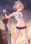  1girl absurdres armpits bandeau bare_legs belt blonde_hair braid breasts cloud cloudy_sky commentary_request cutoffs denim denim_shorts fate/grand_order fate_(series) feet_out_of_frame french_braid green_eyes hair_ornament hair_scrunchie halterneck highres mordred_(fate) mordred_(fate)_(all) navel nekobell outdoors ponytail red_scrunchie rock scrunchie short_shorts shorts sky small_breasts smile solo thighs 