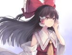  1girl :/ ascot blurry bow brown_hair depth_of_field detached_sleeves hair_bow hair_tubes hakurei_reimu highres kizitora_hato large_bow long_hair looking_to_the_side red_bow ribbon-trimmed_sleeves ribbon_trim touhou 