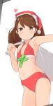  1girl bikini brown_eyes brown_hair co_botan cowboy_shot flat_chest from_below front-tie_top hat heart highres kantai_collection long_hair navel red_bikini ryuujou_(kantai_collection) sack santa_hat simple_background smile solo standing swimsuit twintails white_background 