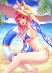  1girl :d animal_ear_fluff animal_ears arm_up bangs bare_arms bare_legs bare_shoulders barefoot beach bikini blue_bikini blue_sky bracelet breasts brown_eyes brown_hat cloud cloudy_sky commentary_request day ears_through_headwear eyebrows_visible_through_hair fate/grand_order fate_(series) fox_ears hair_between_eyes hand_on_headwear hat highres horizon innertube jewelry large_breasts long_hair looking_at_viewer lunacle navel no_tail ocean open_mouth outdoors palm_tree red_hair sand shadow shawl side-tie_bikini sky smile solo stomach straw_hat swimsuit tamamo_(fate)_(all) tamamo_no_mae_(fate) tamamo_no_mae_(swimsuit_lancer)_(fate) transparent tree water 