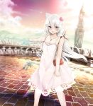  1girl absurdres animal_ears azur_lane bag bell blue_eyes blurry blush bow breasts brick_road cat_ears cat_tail city cityscape cleavage clenched_hand cloud collarbone commentary_request depth_of_field dress eyebrows_visible_through_hair eyelashes fang flower furrowed_eyebrows hair_between_eyes hair_bow hair_flower hair_ornament hammann_(azur_lane) handbag highres jewelry long_hair looking_at_viewer medium_breasts necklace open_mouth pendant pointing railing river rurekuchie sky solo spaghetti_strap sunset tail tail_bell tail_ornament tears tower tsurime very_long_hair white_hair wind 
